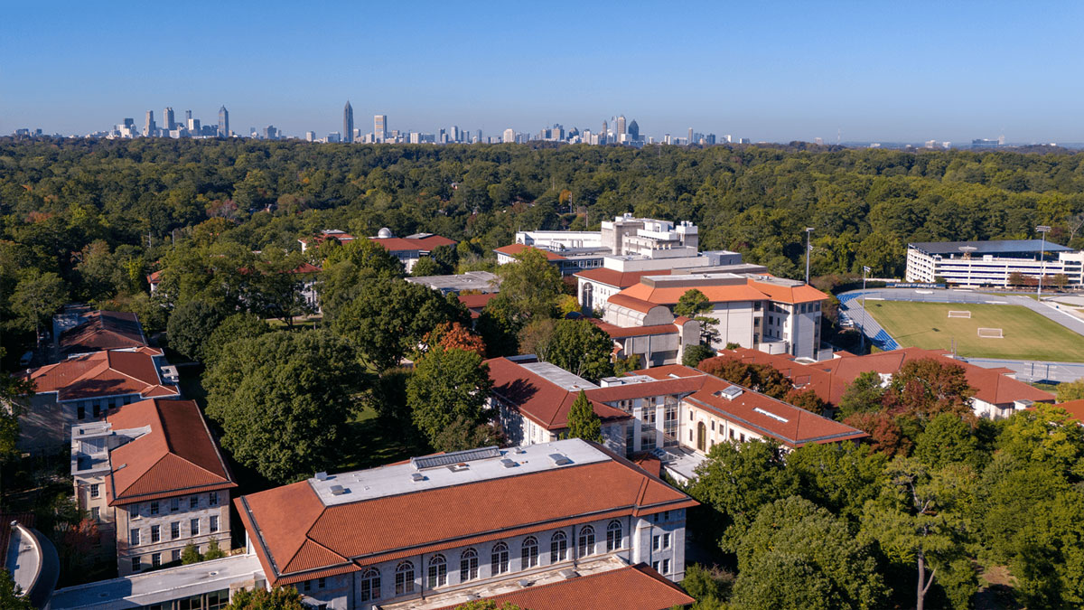 aerial view of emory with atlanta skyline 